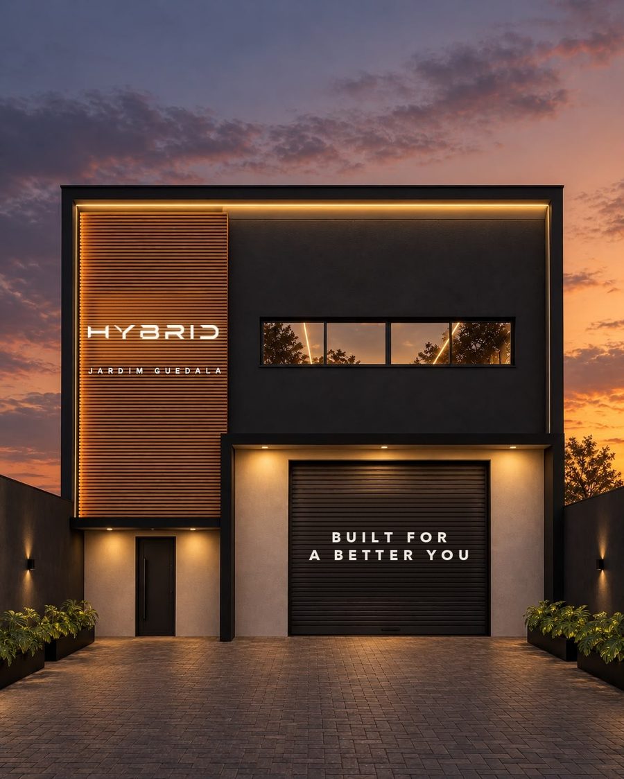 Fachada da HYBRID com letreiro iluminado e portão preto